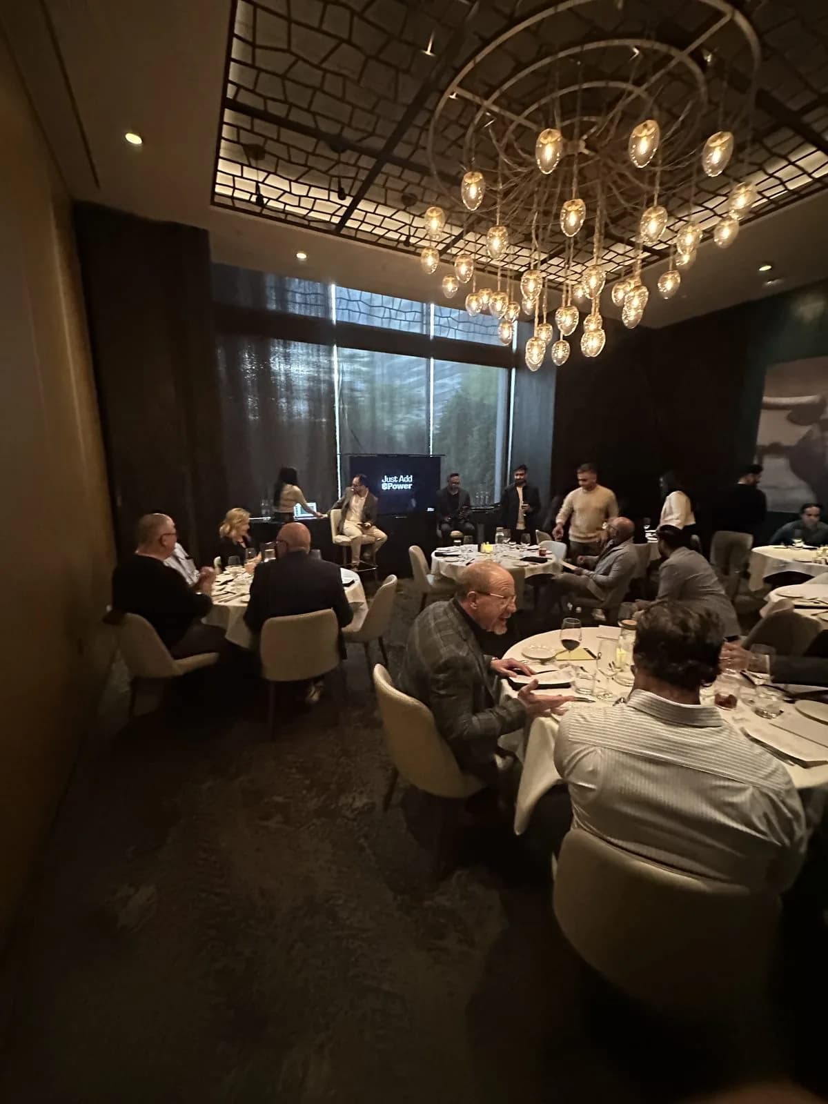 Conversation across the tables before the presentation starts