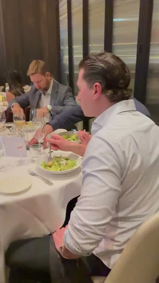 Guests eating between segments of the talk